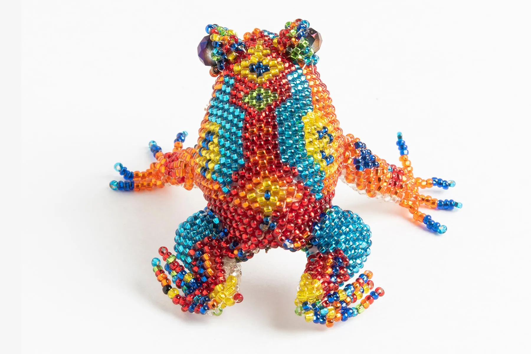 Frog: medium; brilliant red, blue, orange, yellow