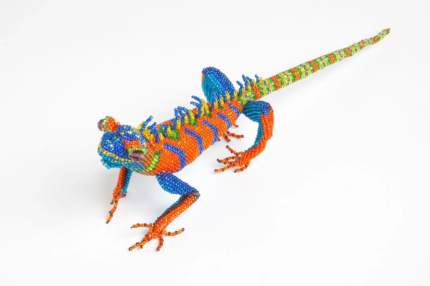 Lizard: large; orange, blue, yellow, green