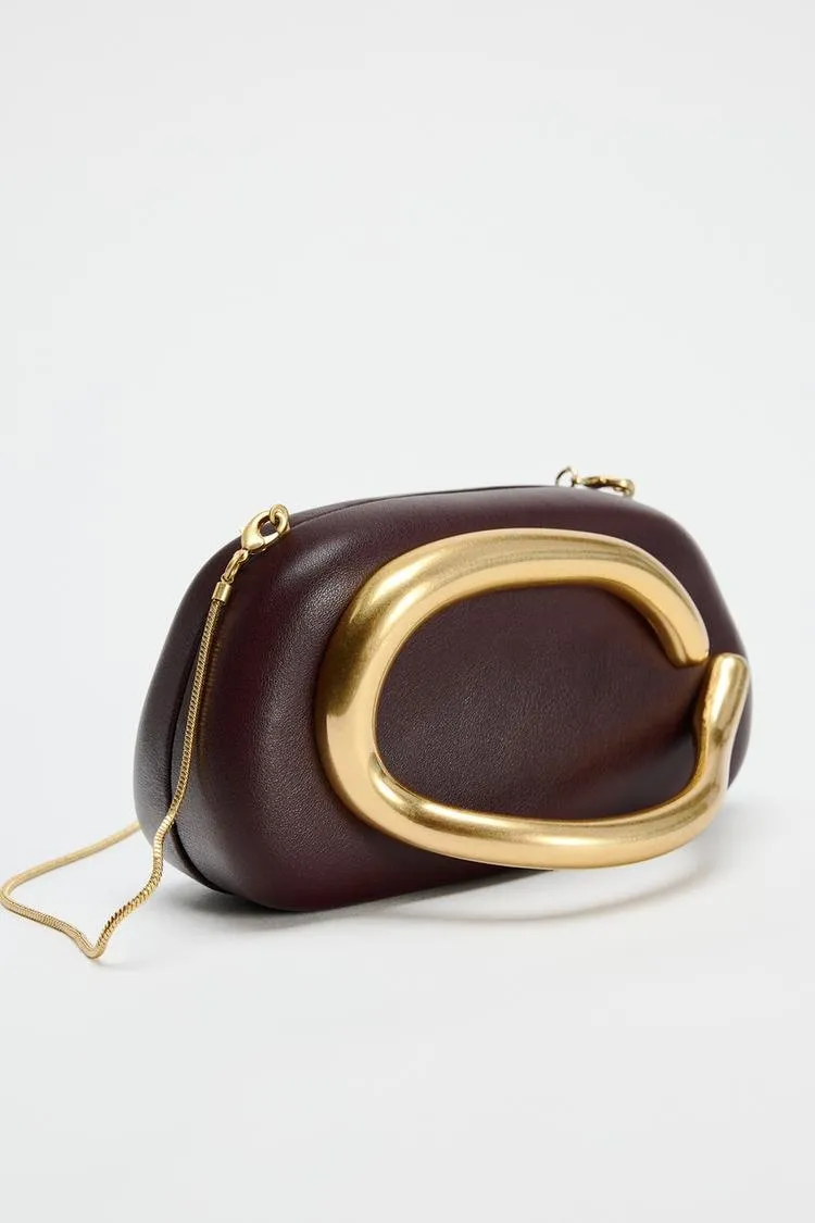 Metal embellished clutch
