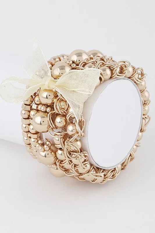 Multi ribbon beaded bracelet