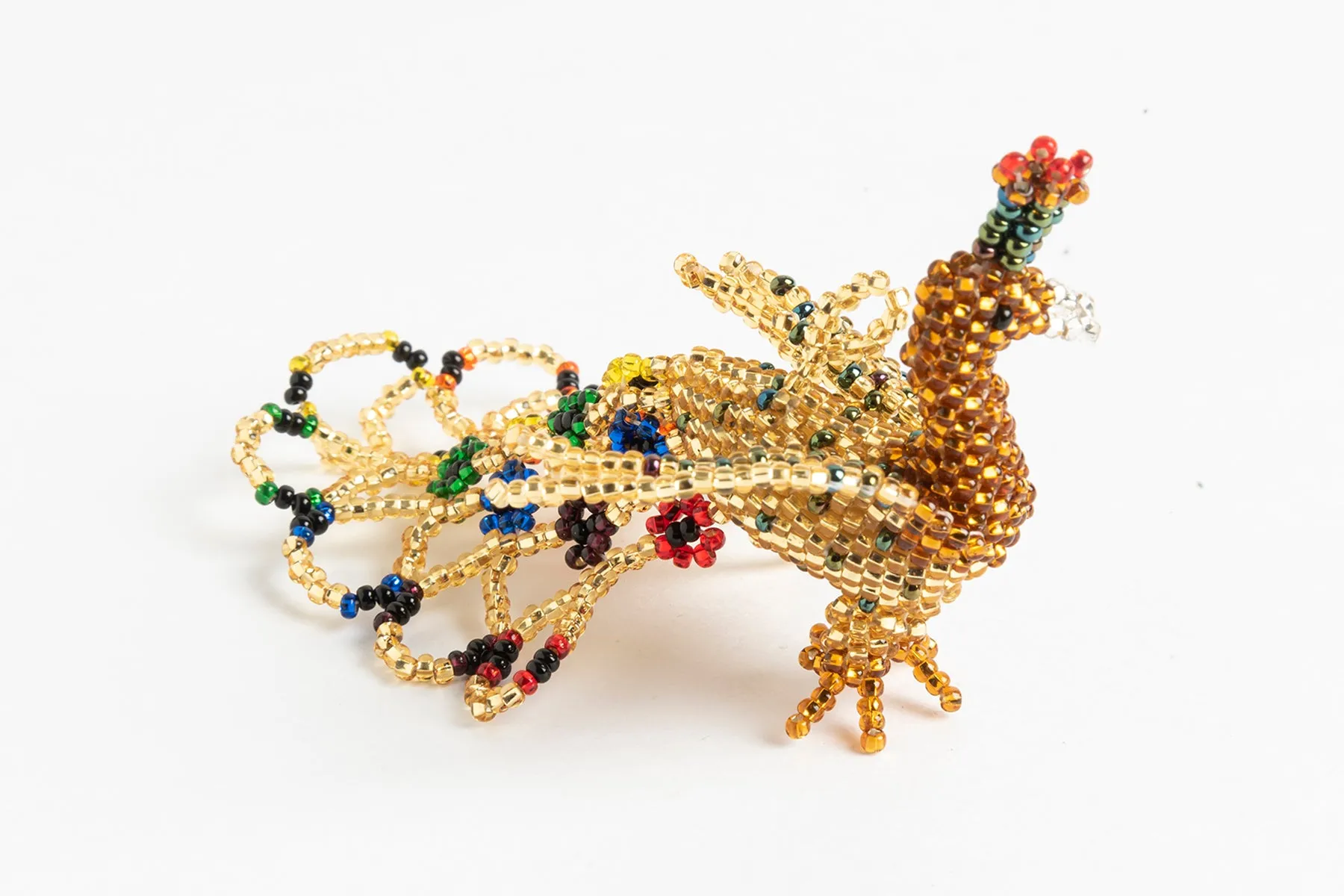 Peacock; small; gold, green, rainbow colors