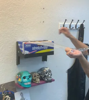 Plastic wrap holder