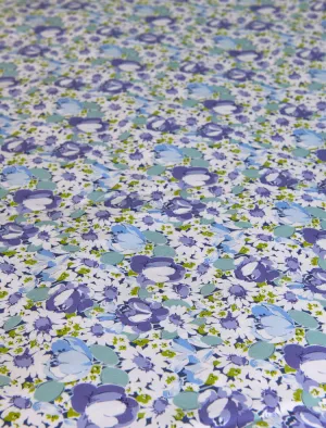 Stamattina 100% Cotton 118" Italian Percale By The Yard Margaux A multi color floral with a mix of daisies and tulips in blue/multi on optic white ground.
